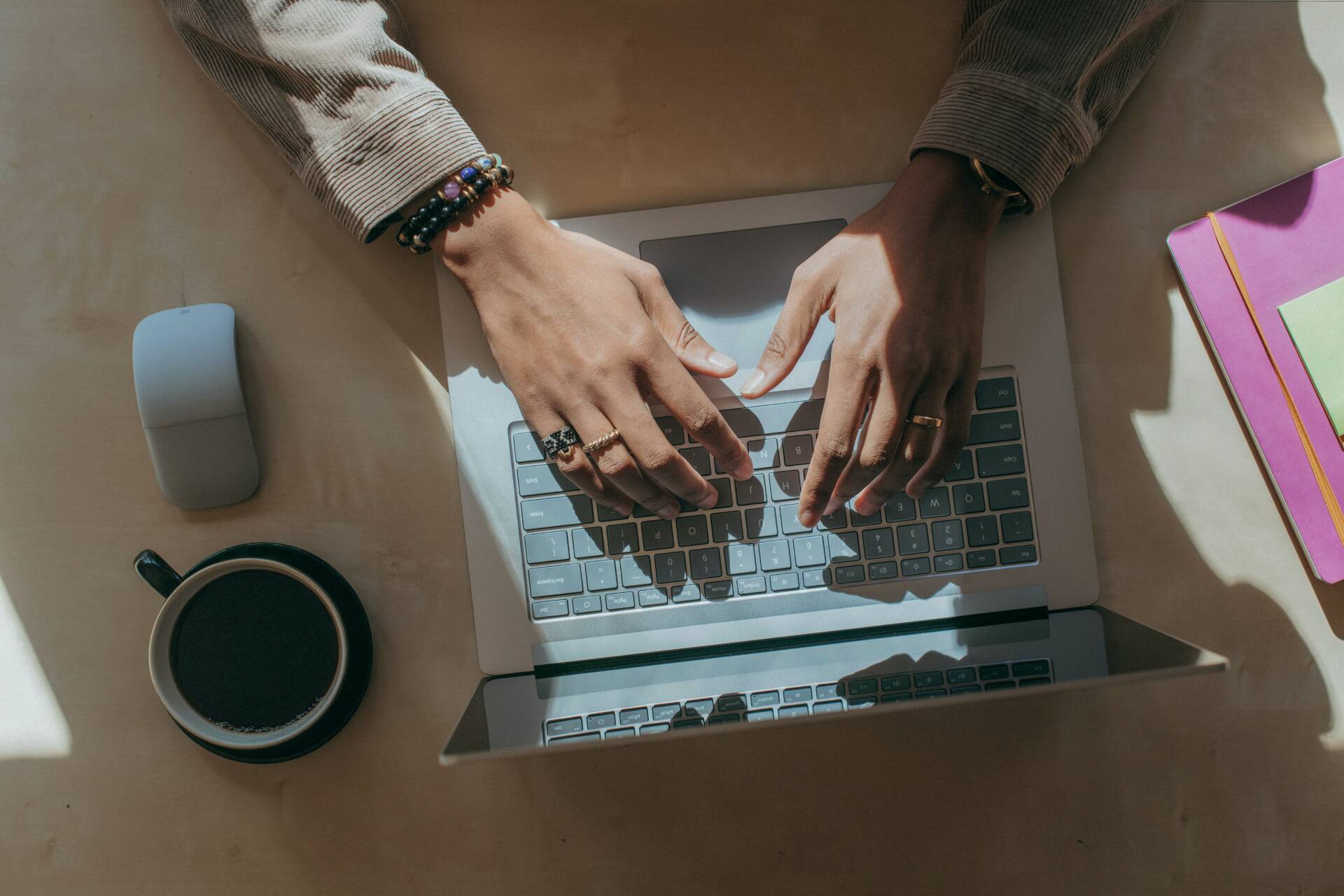 person typing on laptop